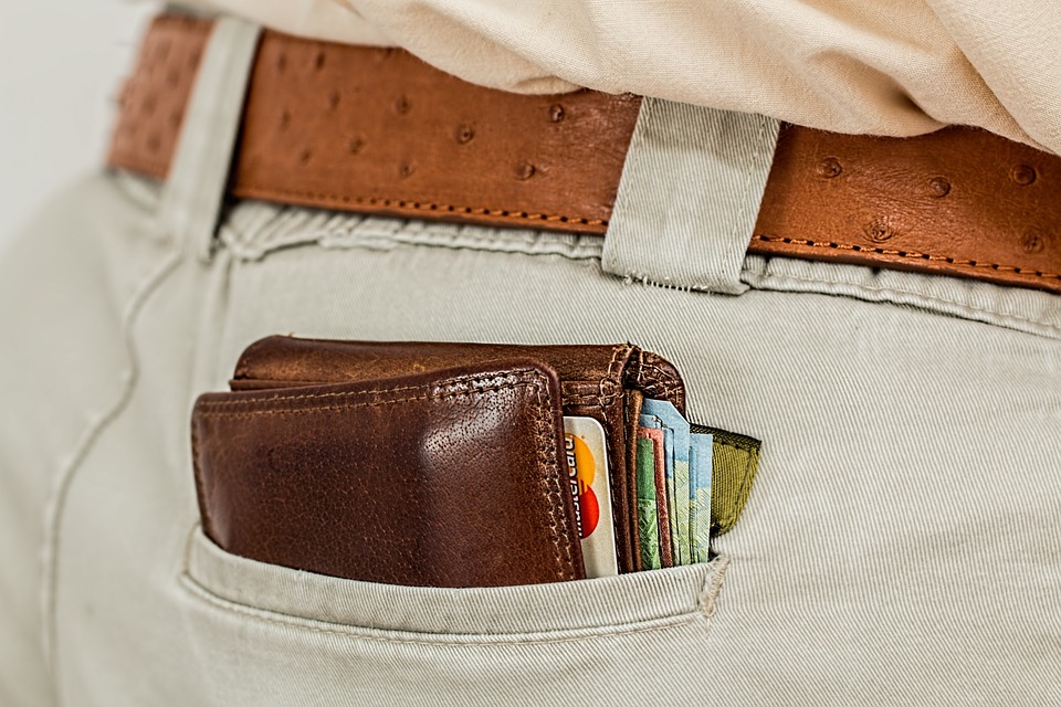 oversized wallet in mans back pants pocket
